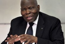 Dr. Kolade