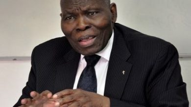 Dr. Kolade