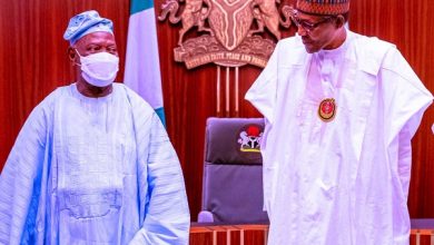 Bisi Akande (L) and President Muhammadu Buhari