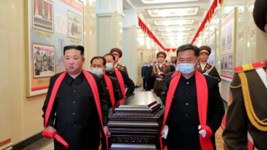 North Korean leader Kim Jong Un (L) carrying the coffin of late Hyon Chol Hae, Marshal of the Korean People’s Army and general adviser to the ministry of national defence during his funeral in Pyongyang. (Photo by KCNA VIA KNS / AFP)