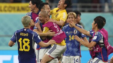 Japan players celebrate after defeating Spain 2-1 in their 2022 FIFA World Cup Group E match in Doha on Thursday. (Photo: AFP-JIJI