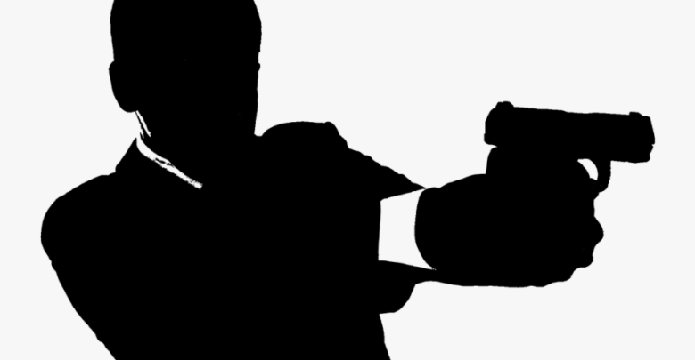 Silhouette of a gunman (Courtesy: www.clipartkey.com)