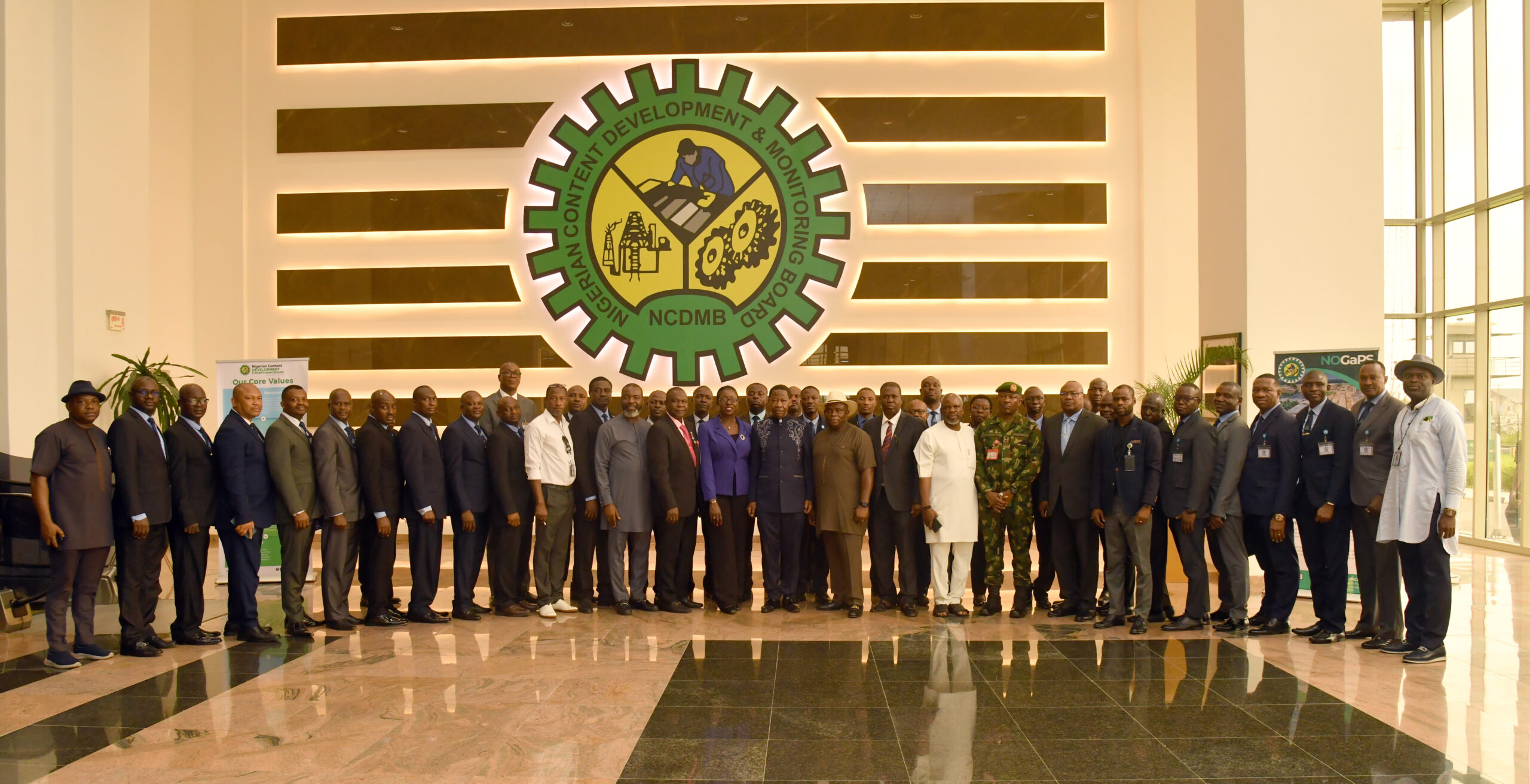 Visiting NARC Officers in a group phpotograph with NCDMB ES, Engr. Felix Omatsola Ogbe and his team